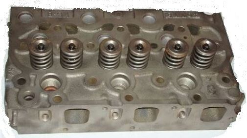 Bobcat 643 Engine Cylinder Head complete w/ valves  part# 6660965 , 6653800